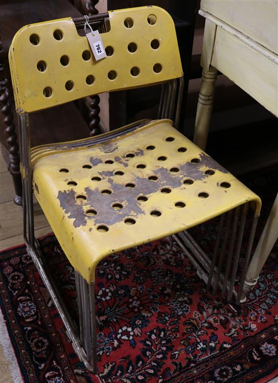 Nine retro metal stacking chairs